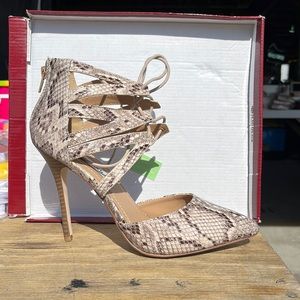 Never been worn snake skin lace up heel